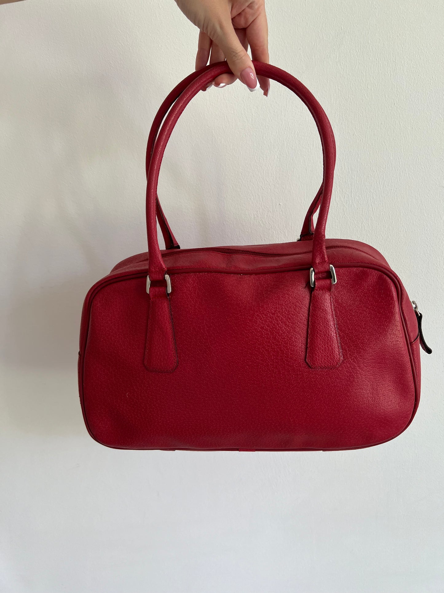Red bag made of genuine leather