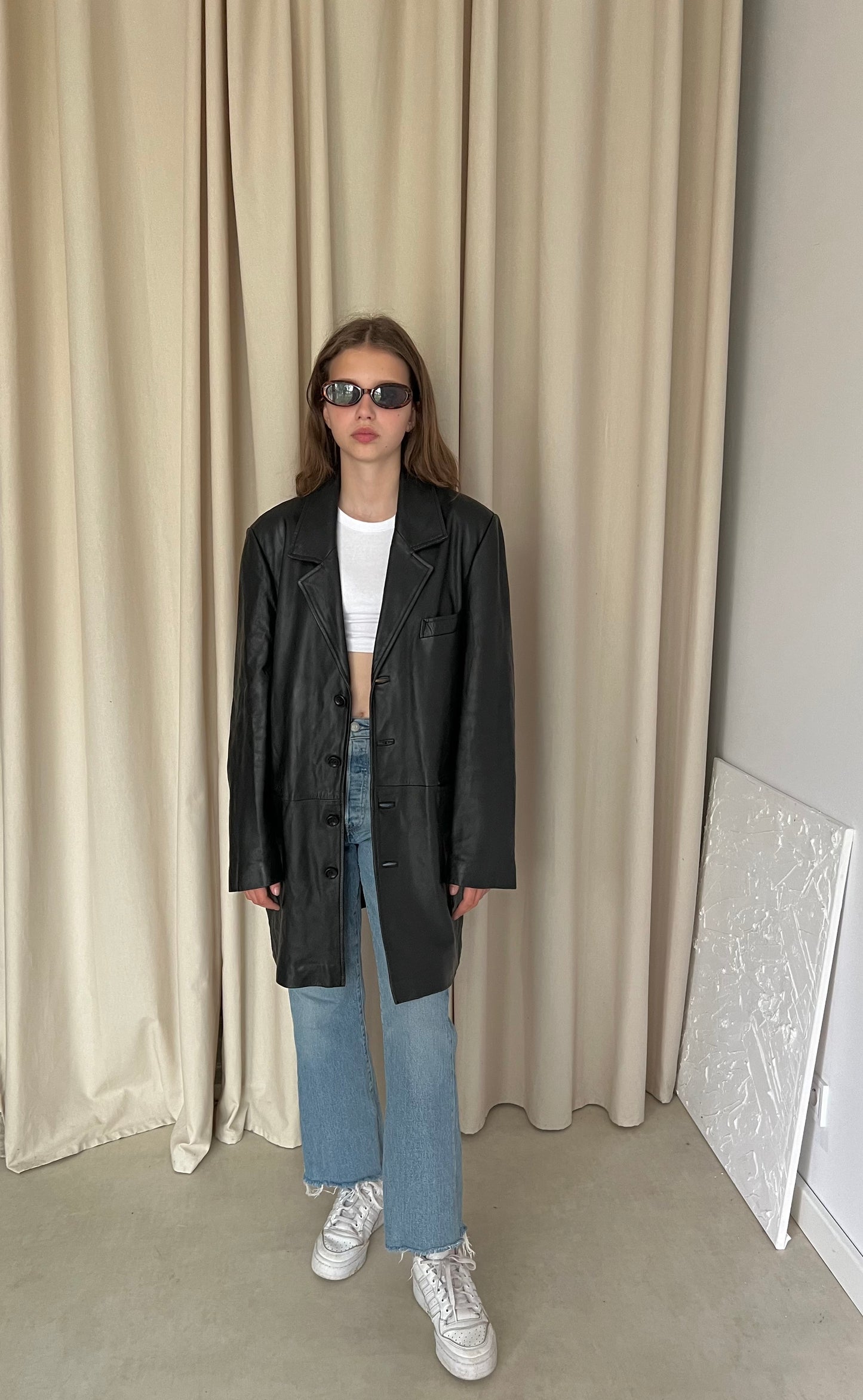 Black coat made of natural leather