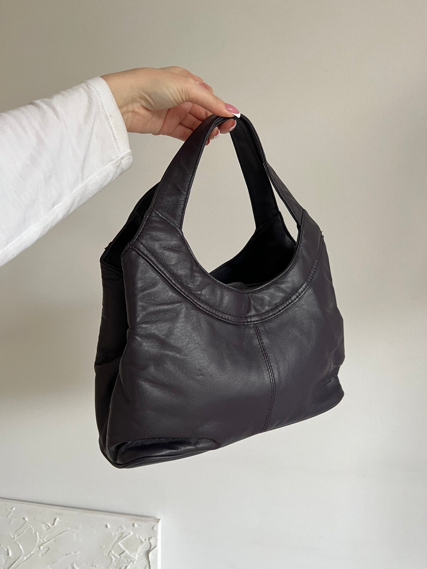 A bag in a shade of purple