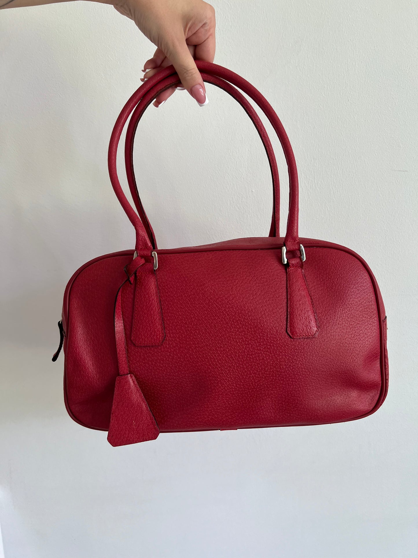 Red bag made of genuine leather