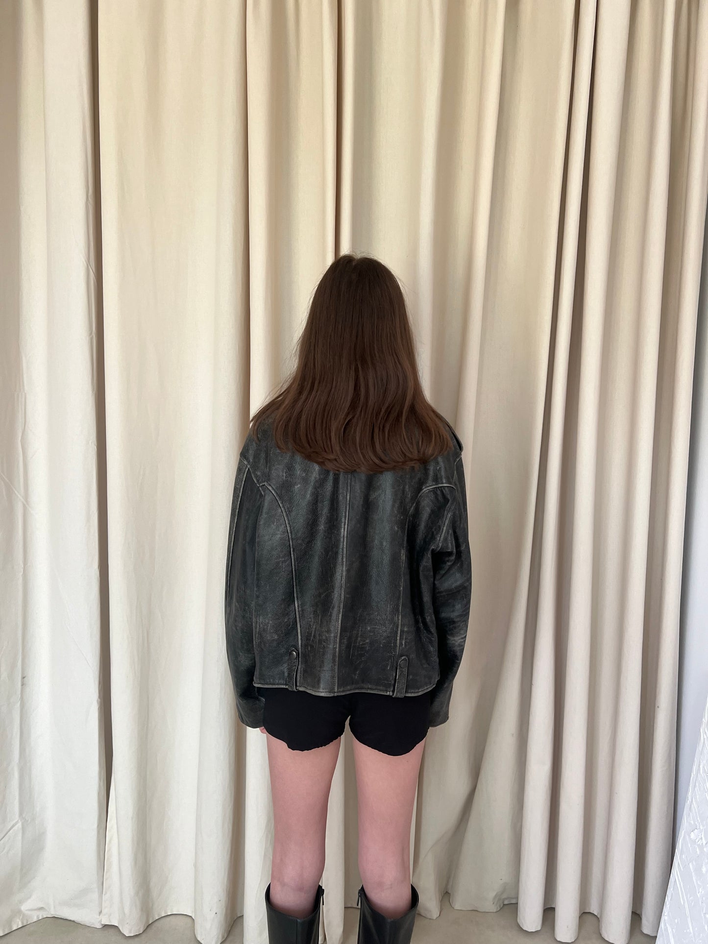A distressed jacket made of genuine leather