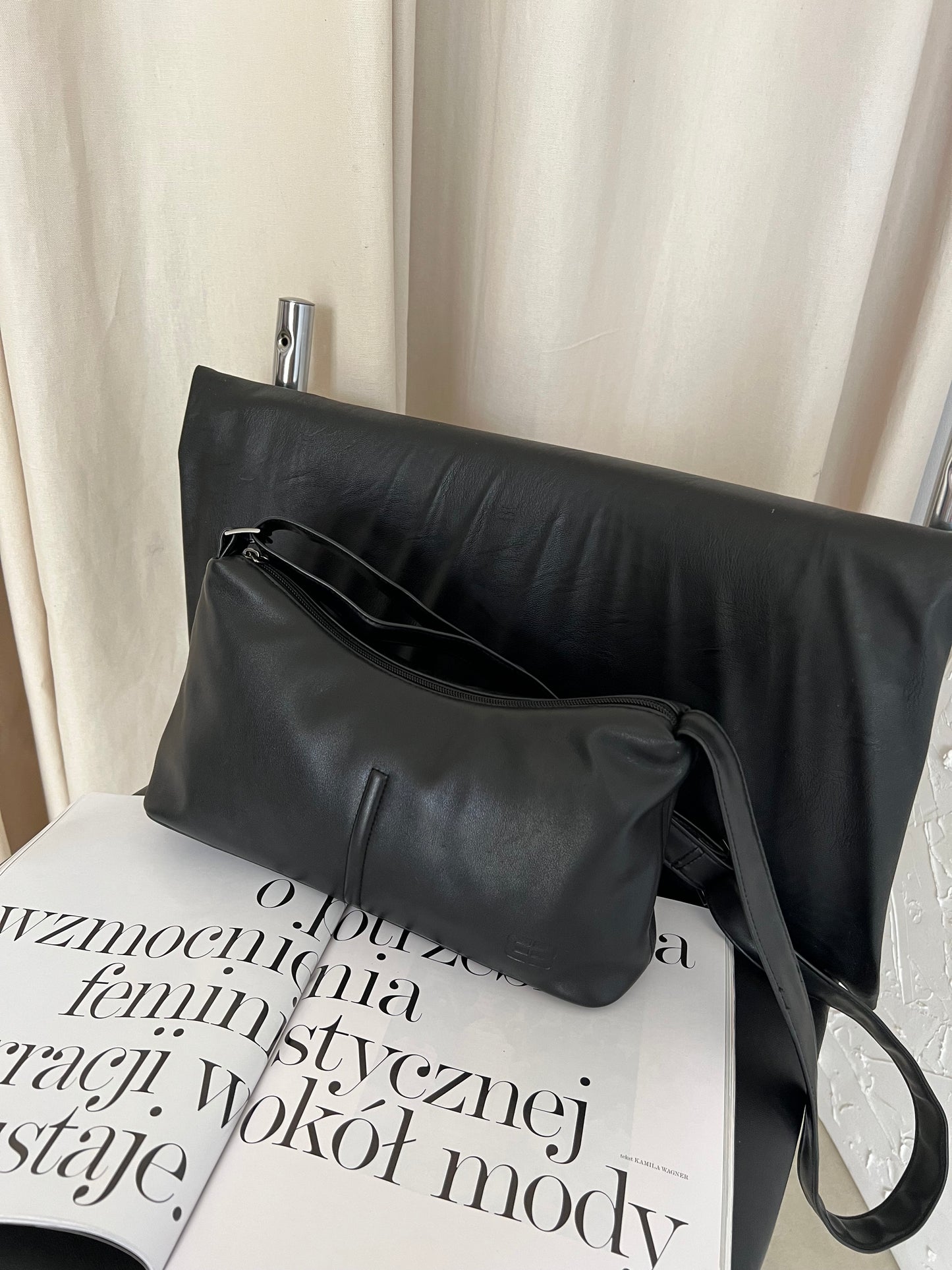 Black bag with a long strap