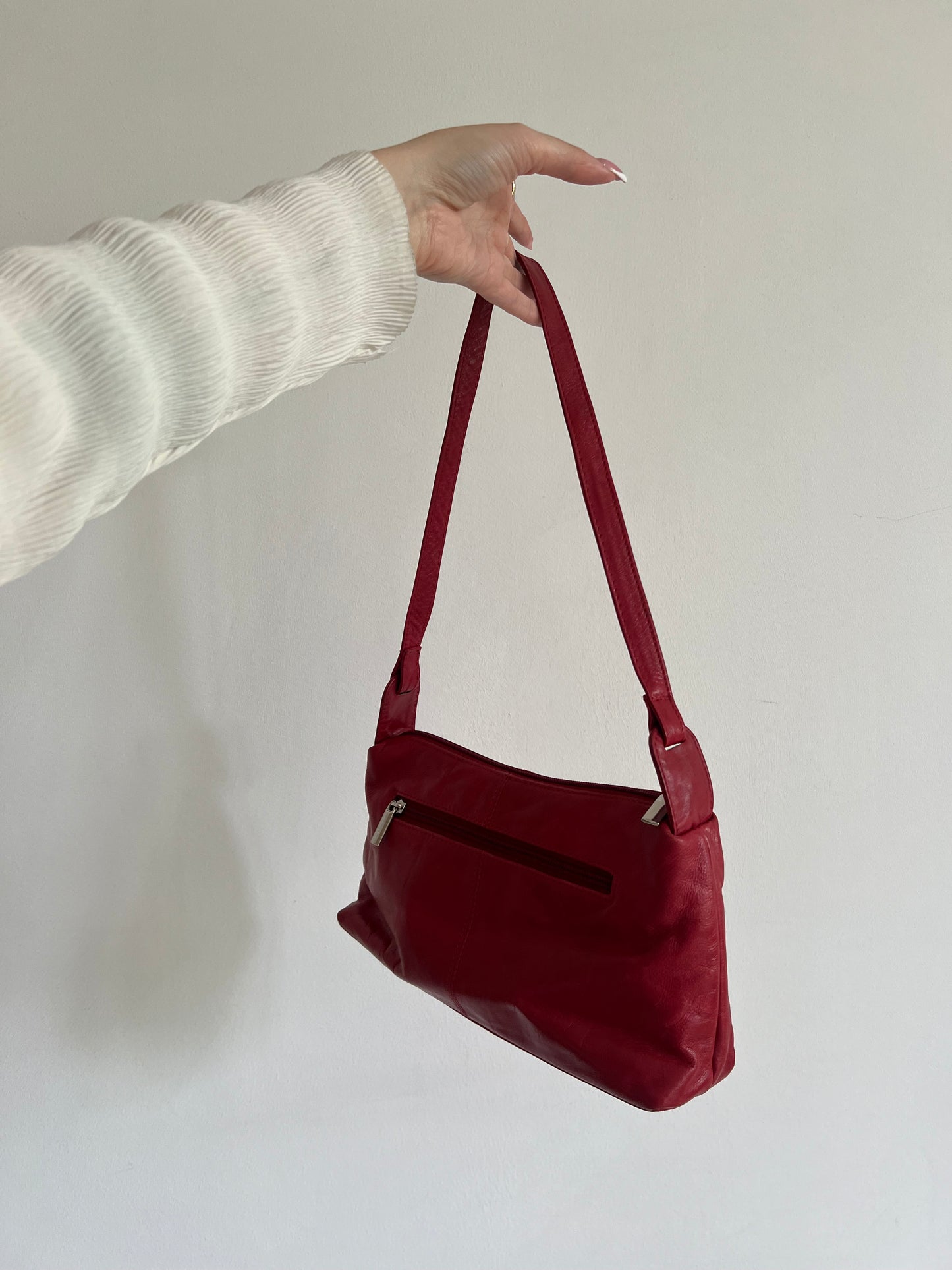 Red bag made of genuine leather
