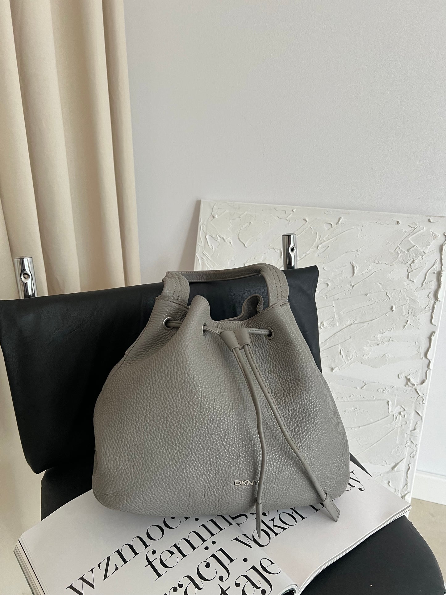 Gray DKNY bag made of genuine leather