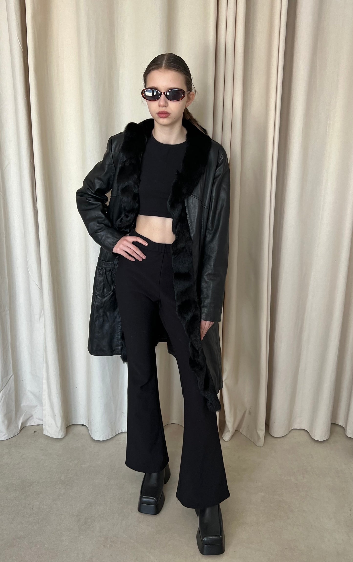 Genuine leather coat with fur trim