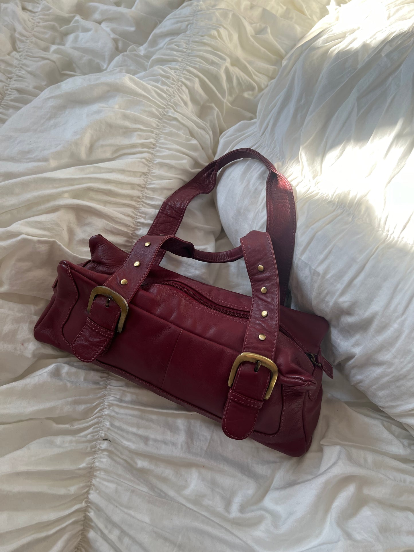 Burgundy shoulder bag made of genuine leather