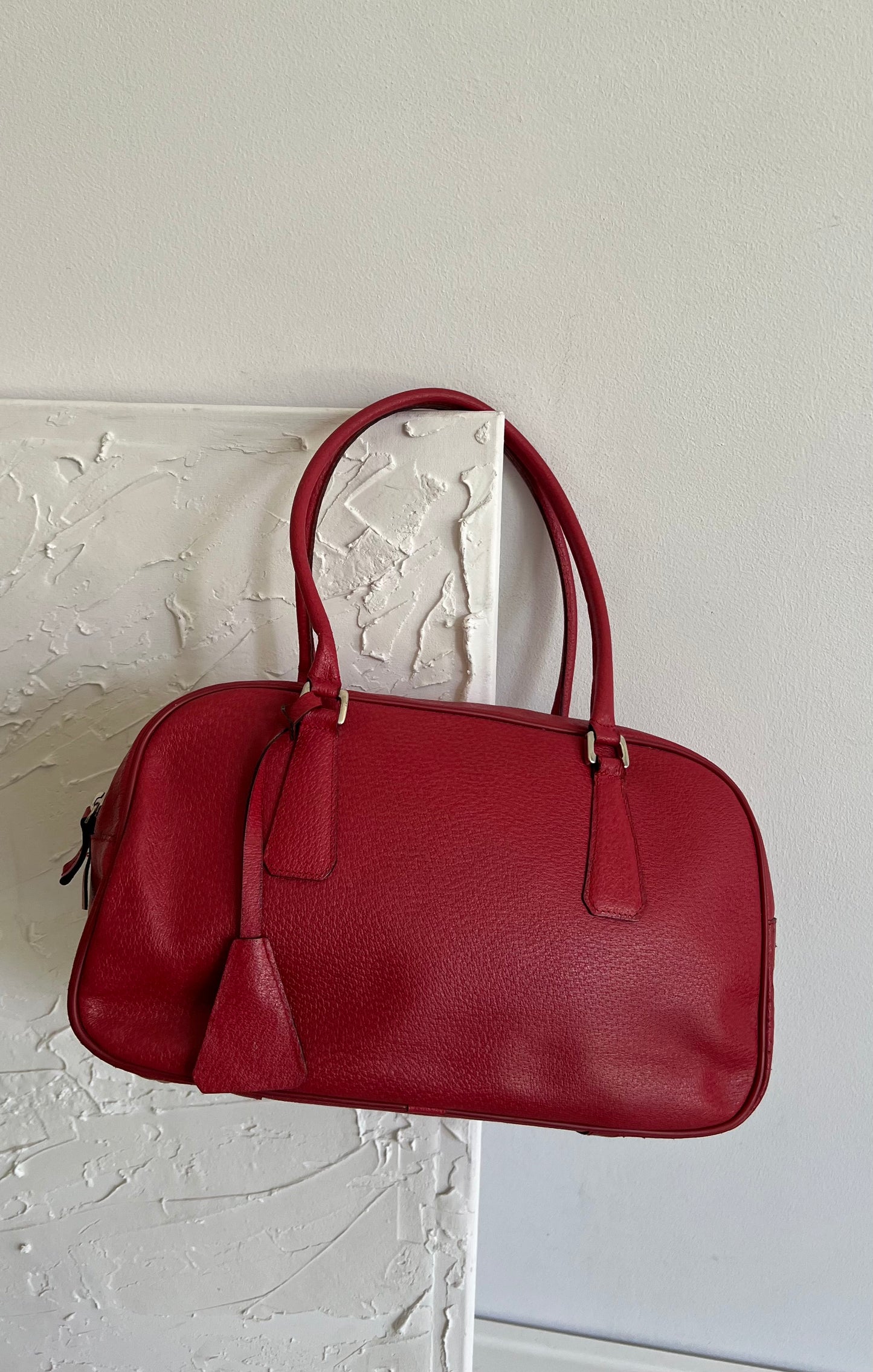 Red bag made of genuine leather