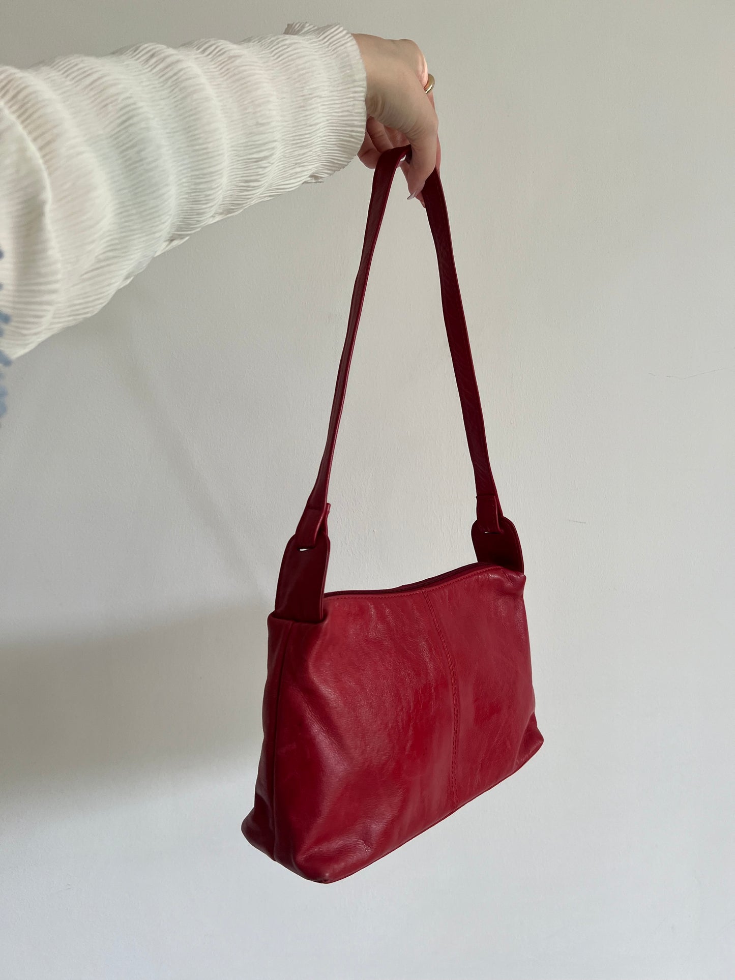 Red bag made of genuine leather