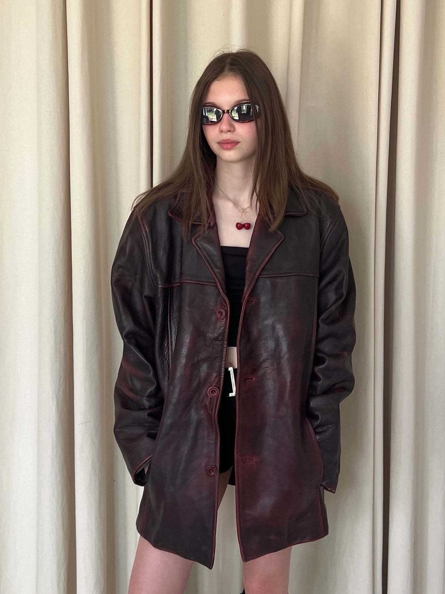 Genuine leather jacket with burgundy abrasions