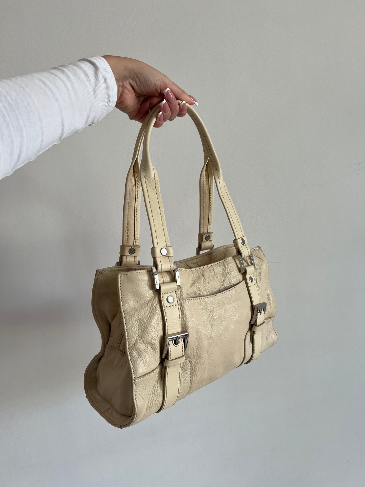Cream bag made of genuine leather