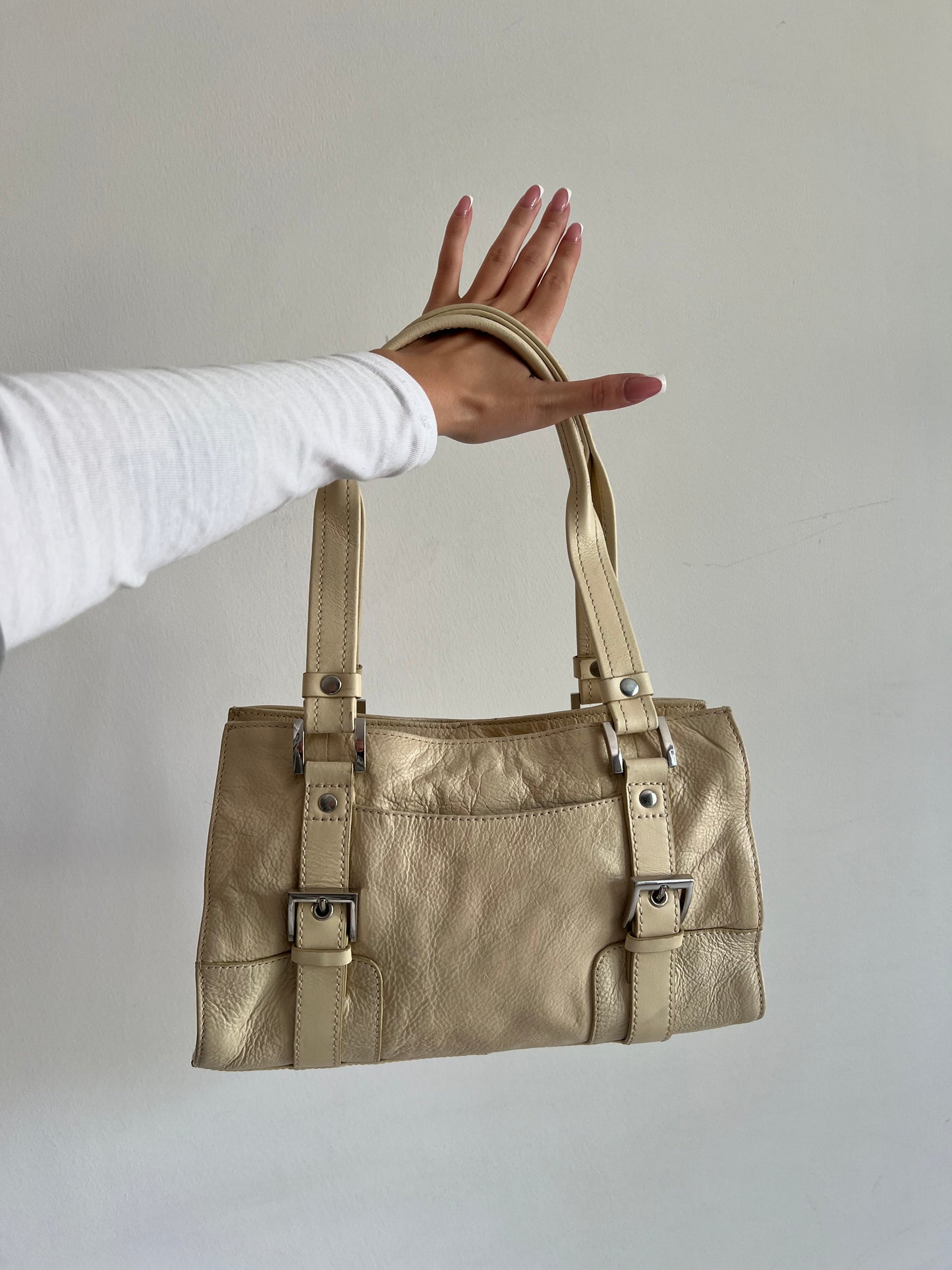 Cream bag made of genuine leather