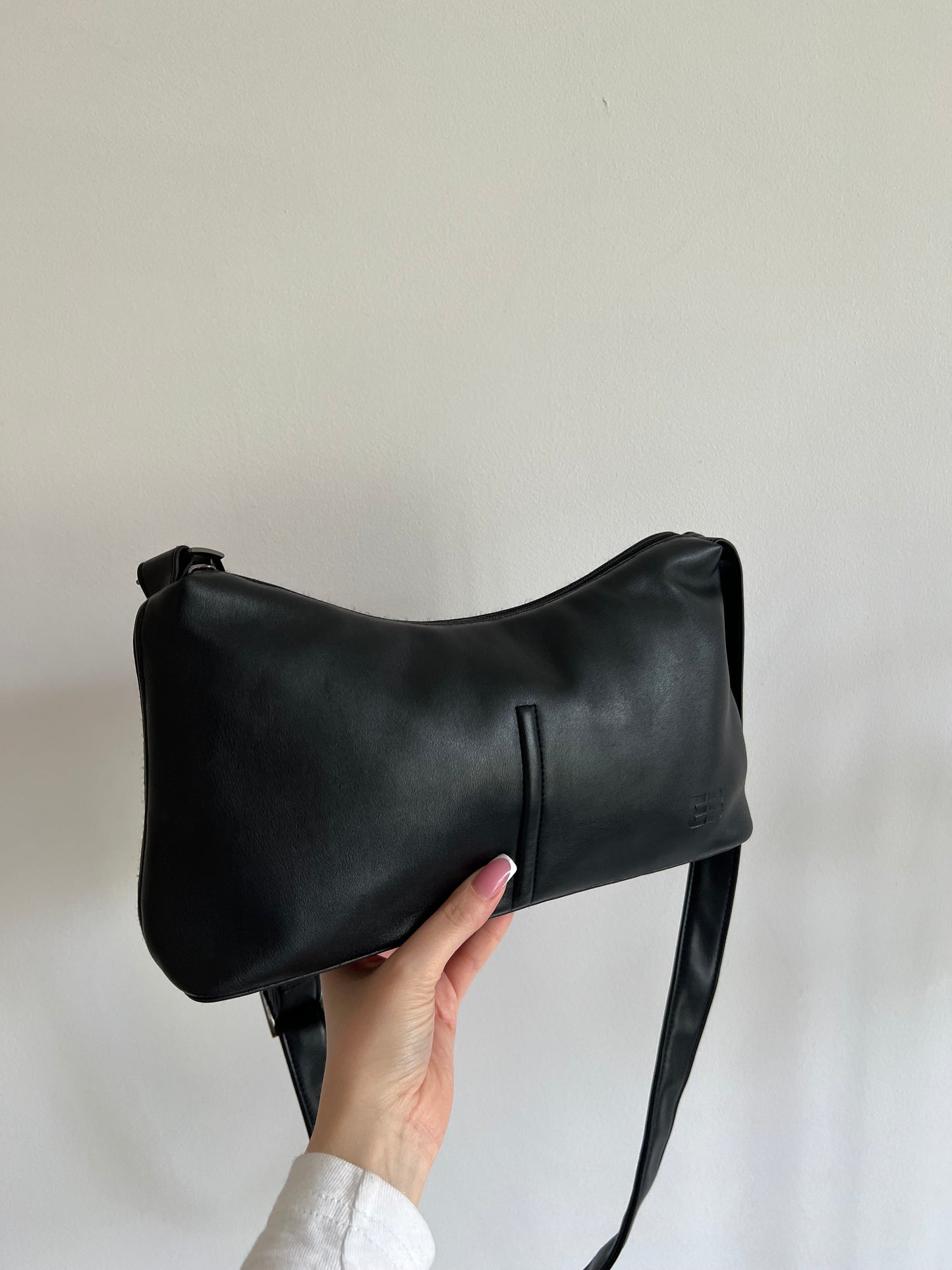 Black bag with a long strap