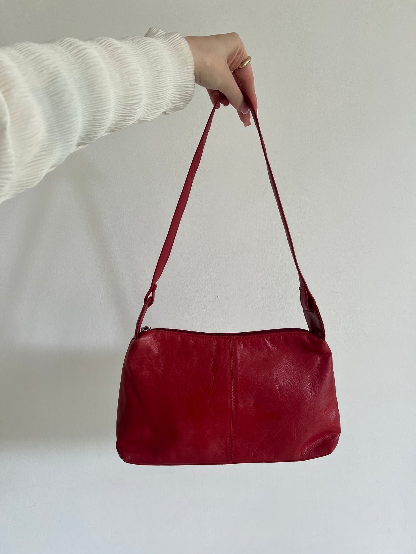 Red bag made of genuine leather