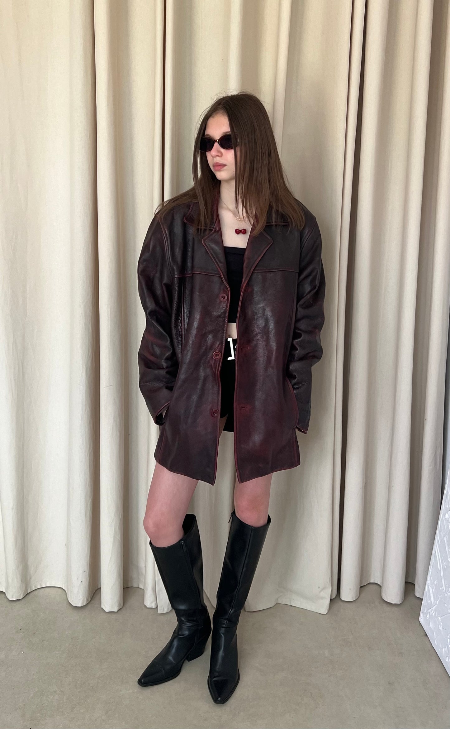 Genuine leather jacket with burgundy abrasions