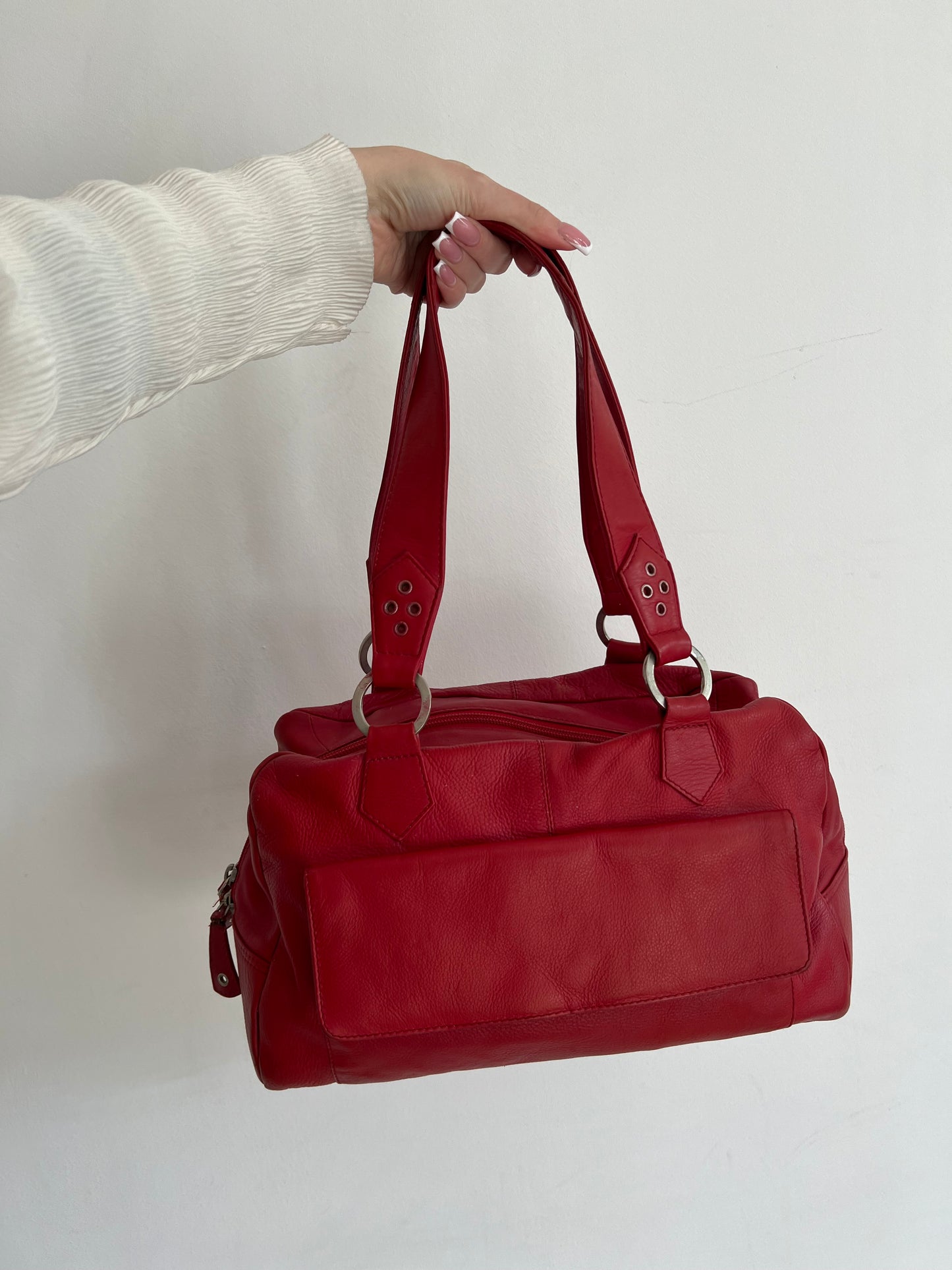Red bag made of natural leather