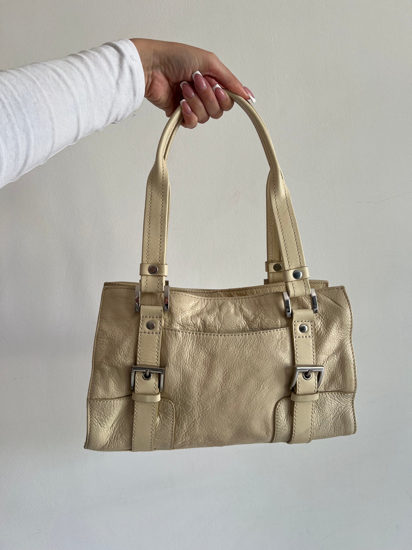 Cream bag made of genuine leather