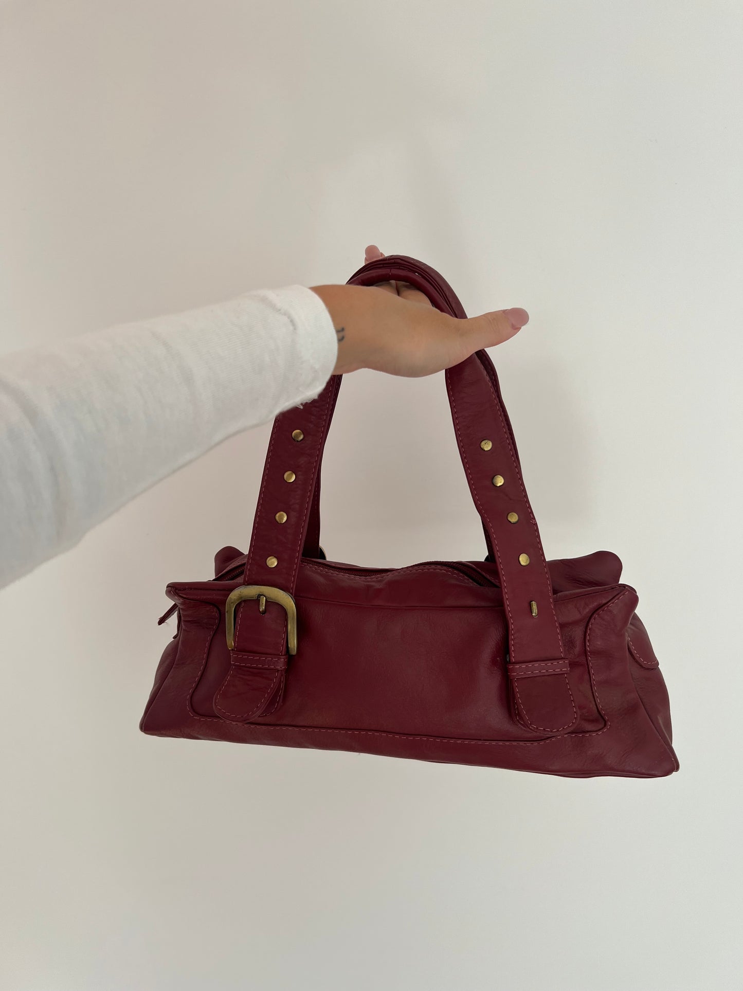 Burgundy shoulder bag made of genuine leather