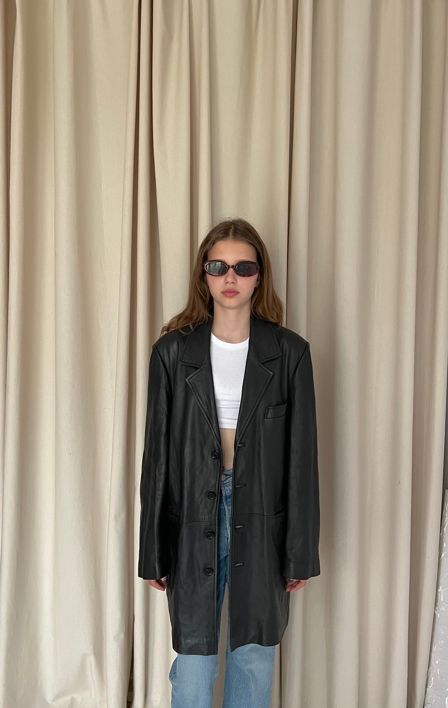 Black coat made of natural leather