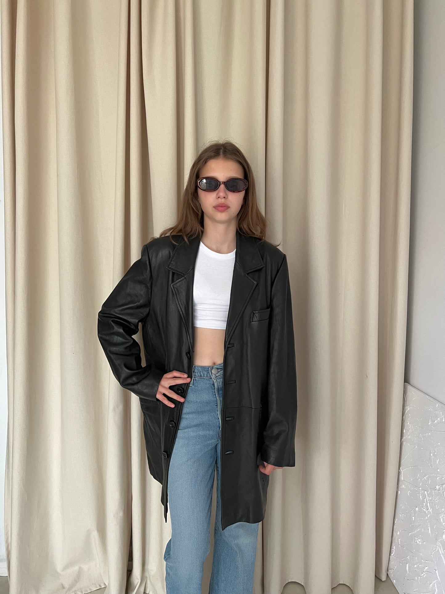 Black coat made of natural leather