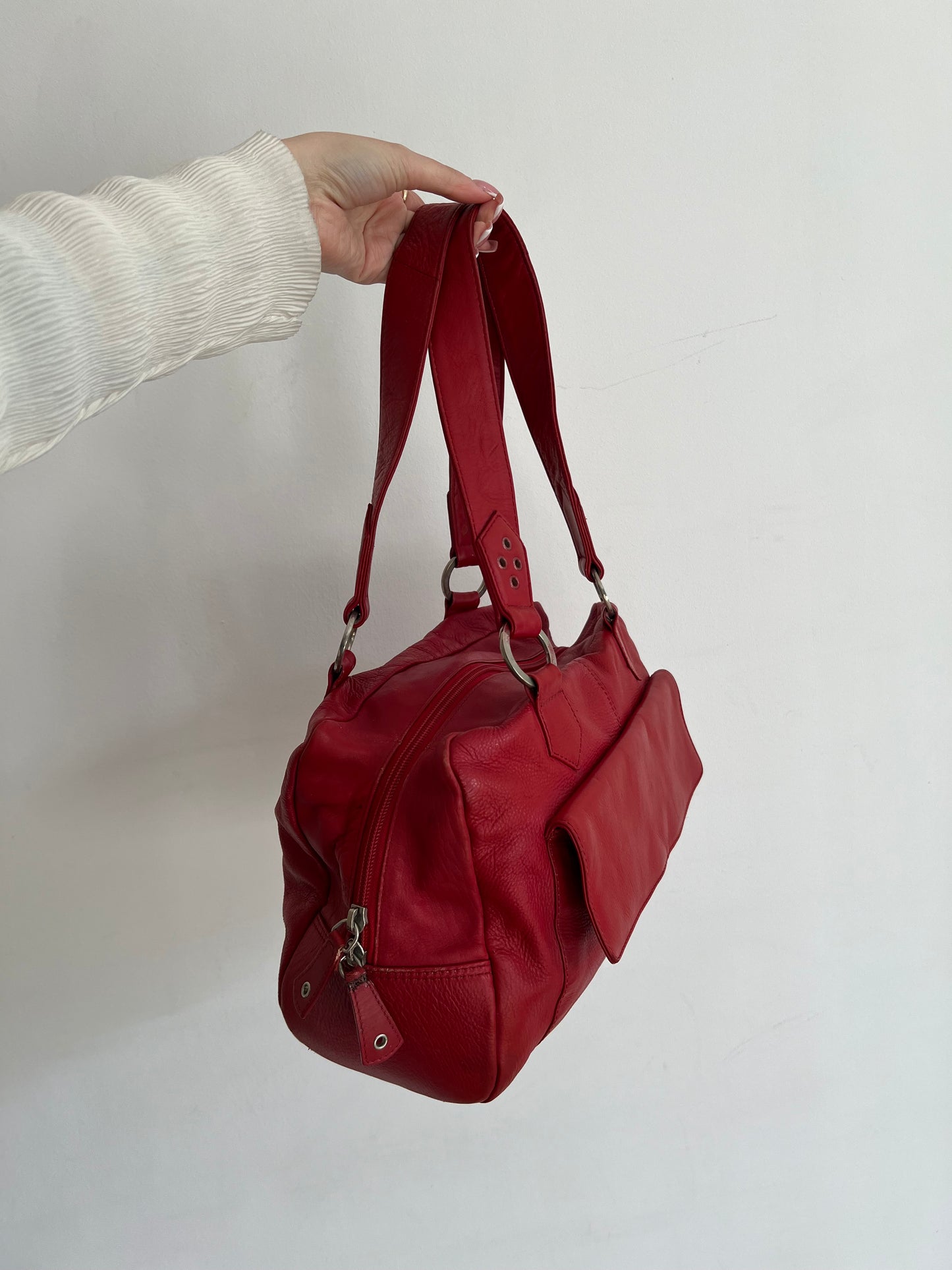 Red bag made of natural leather