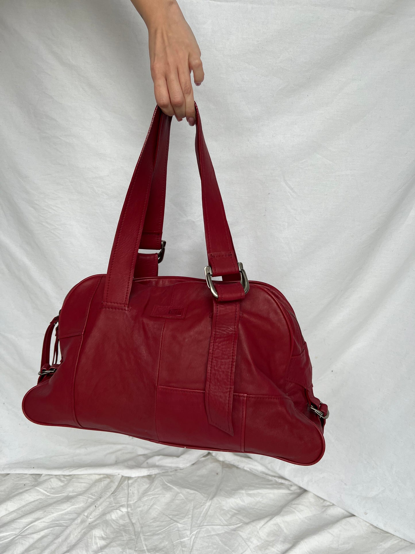 Red bag made of natural leather