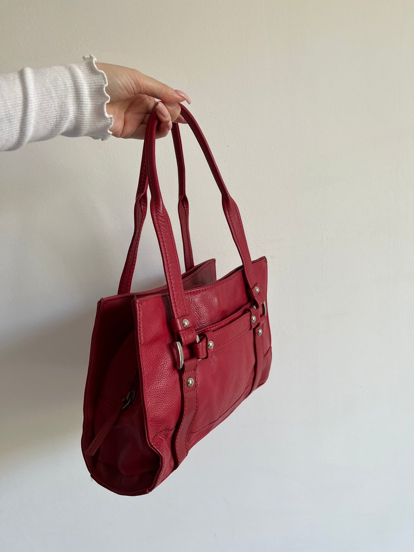 Red bag made of genuine leather