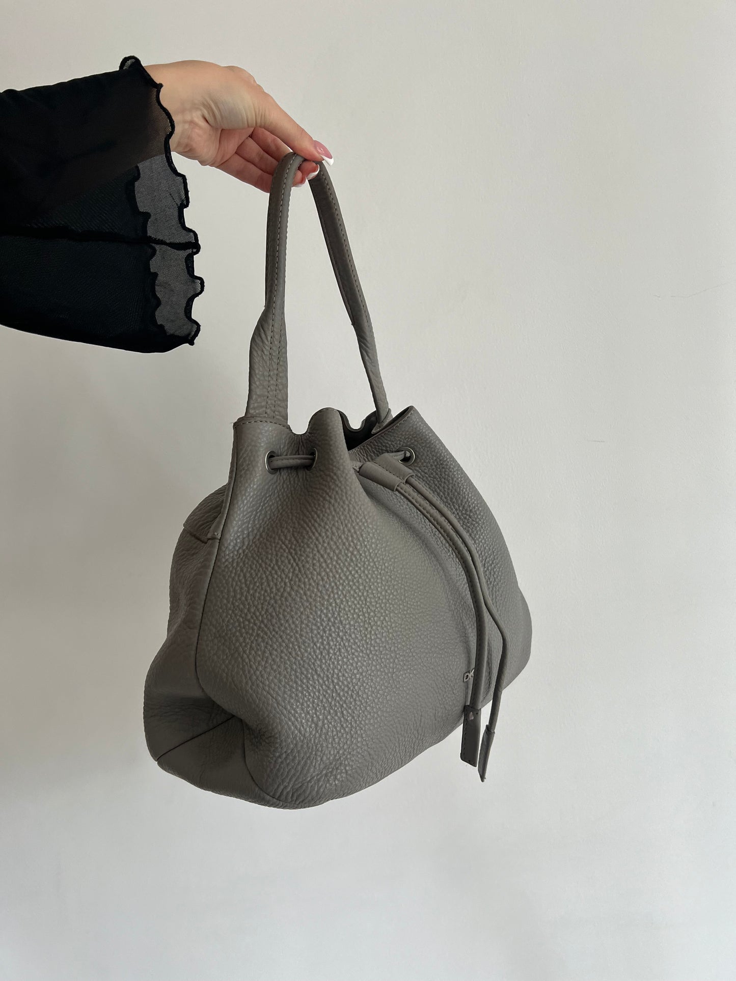 Gray DKNY bag made of genuine leather