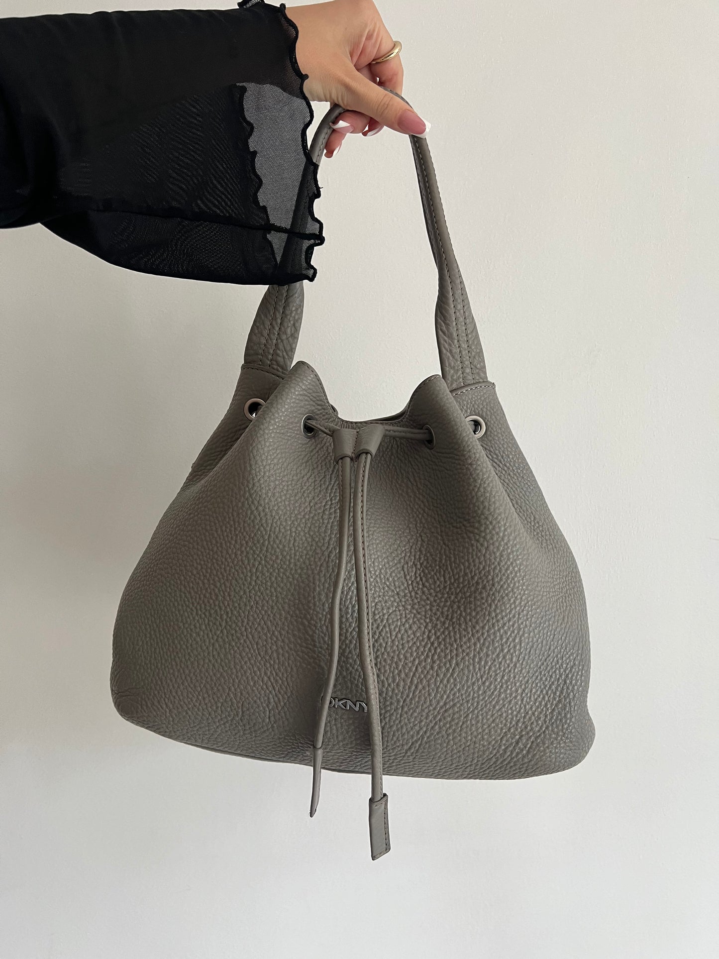 Gray DKNY bag made of genuine leather