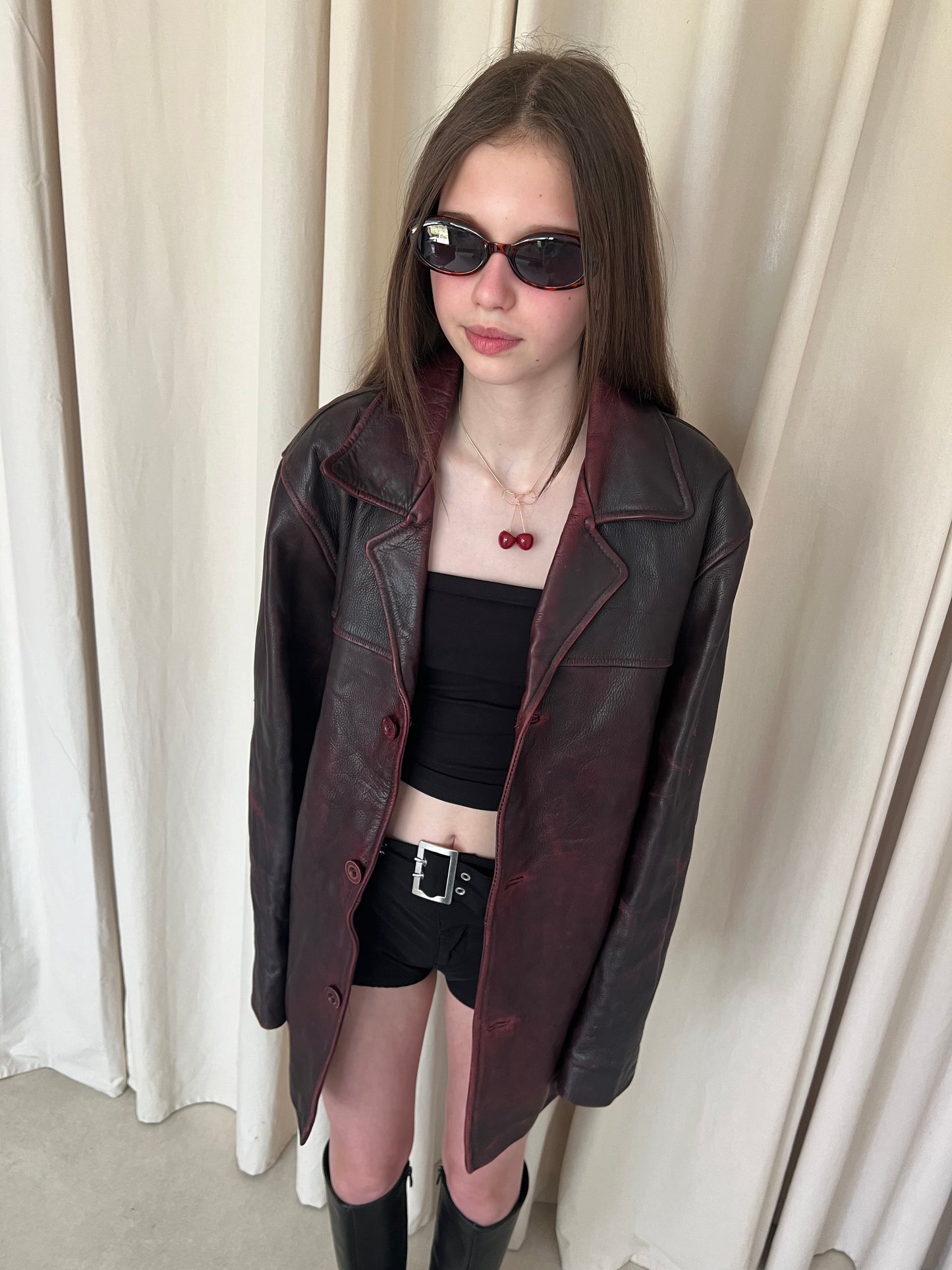 Genuine leather jacket with burgundy abrasions