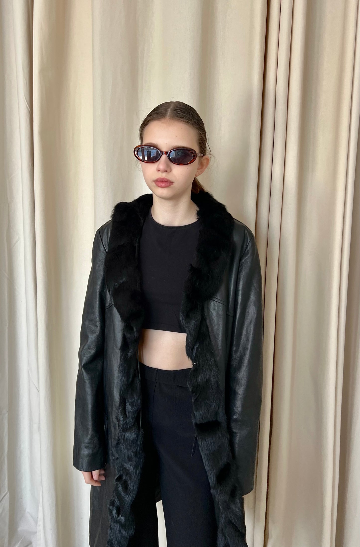Genuine leather coat with fur trim