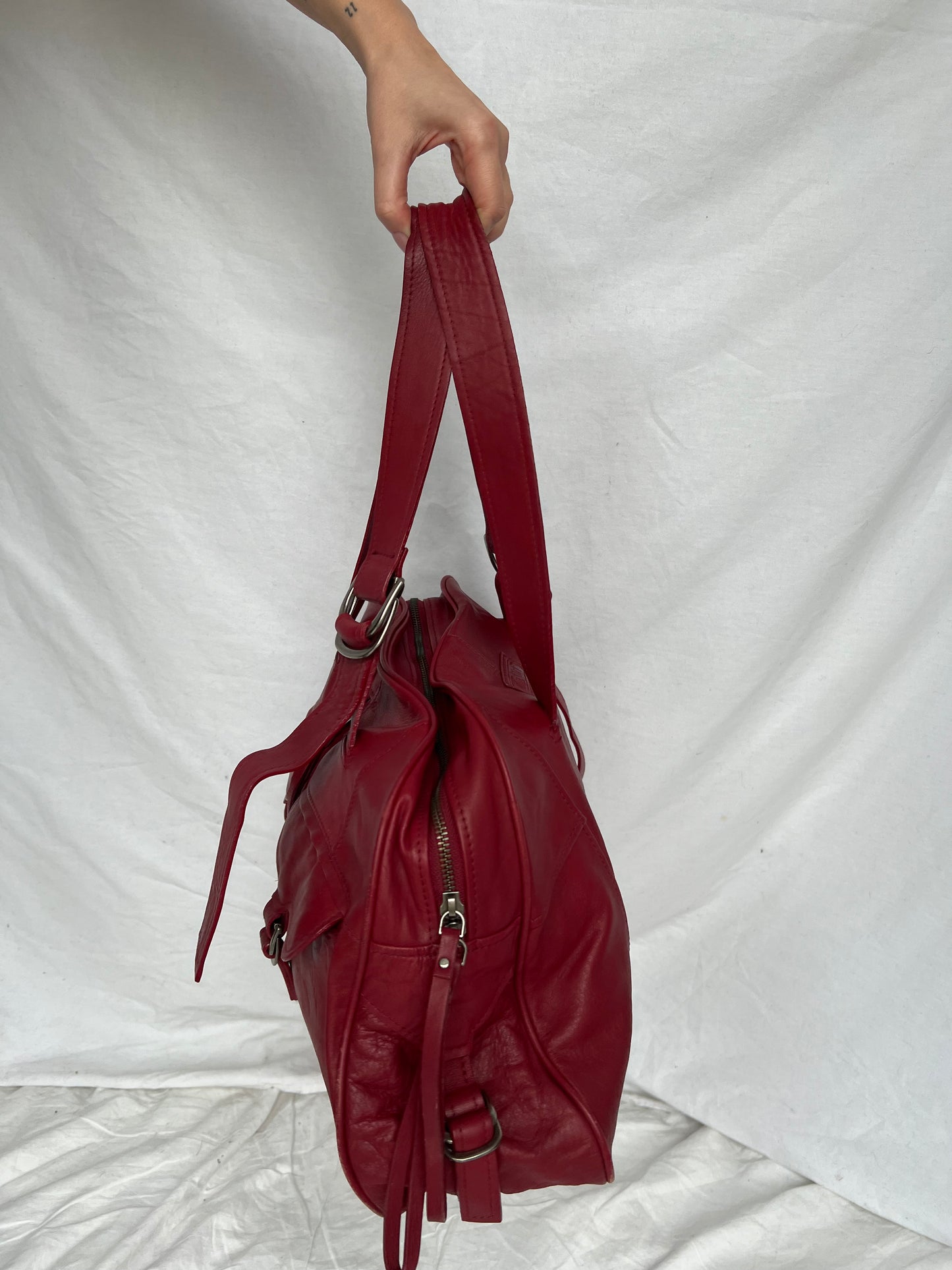 Red bag made of natural leather