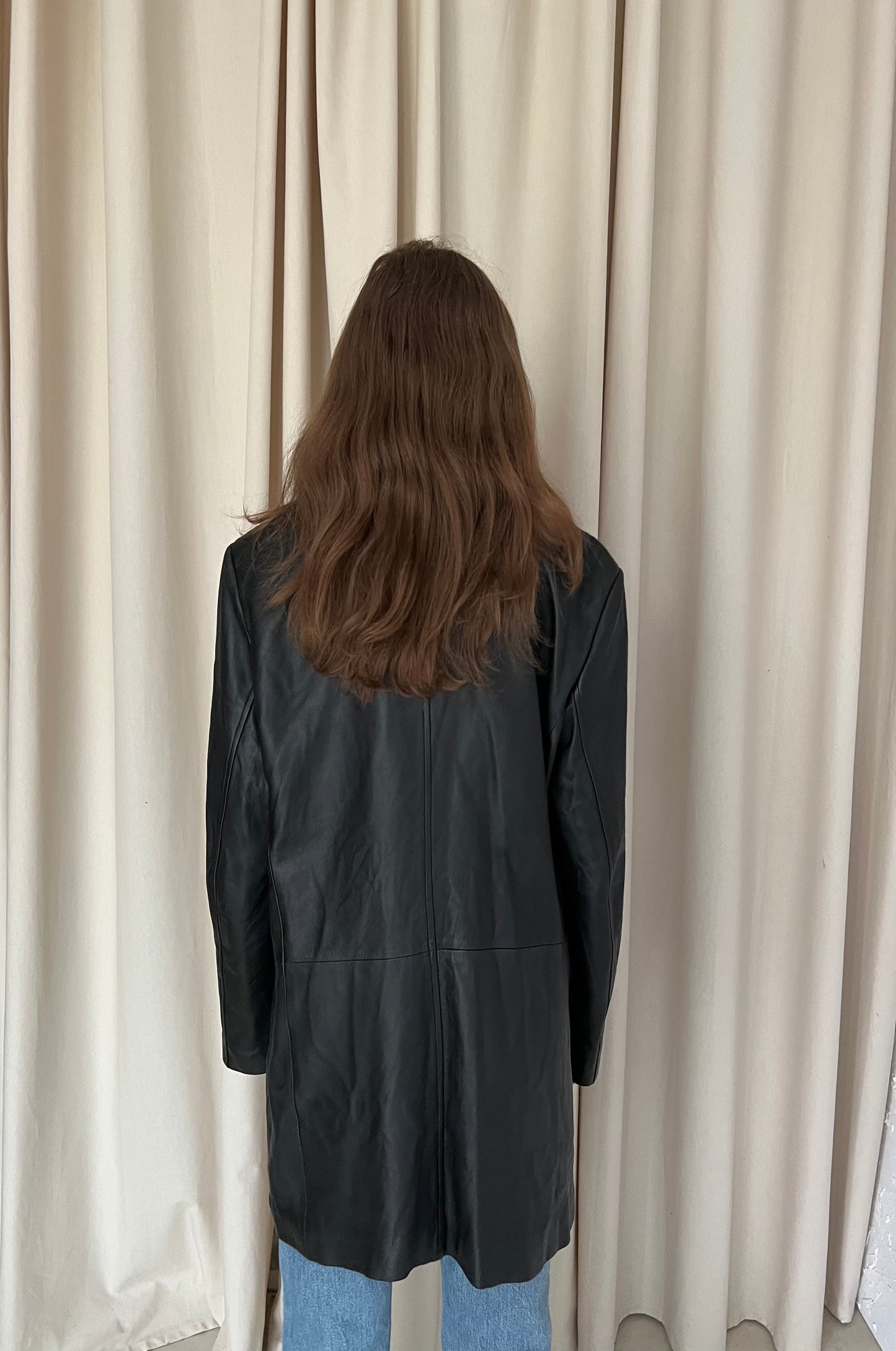 Black coat made of natural leather