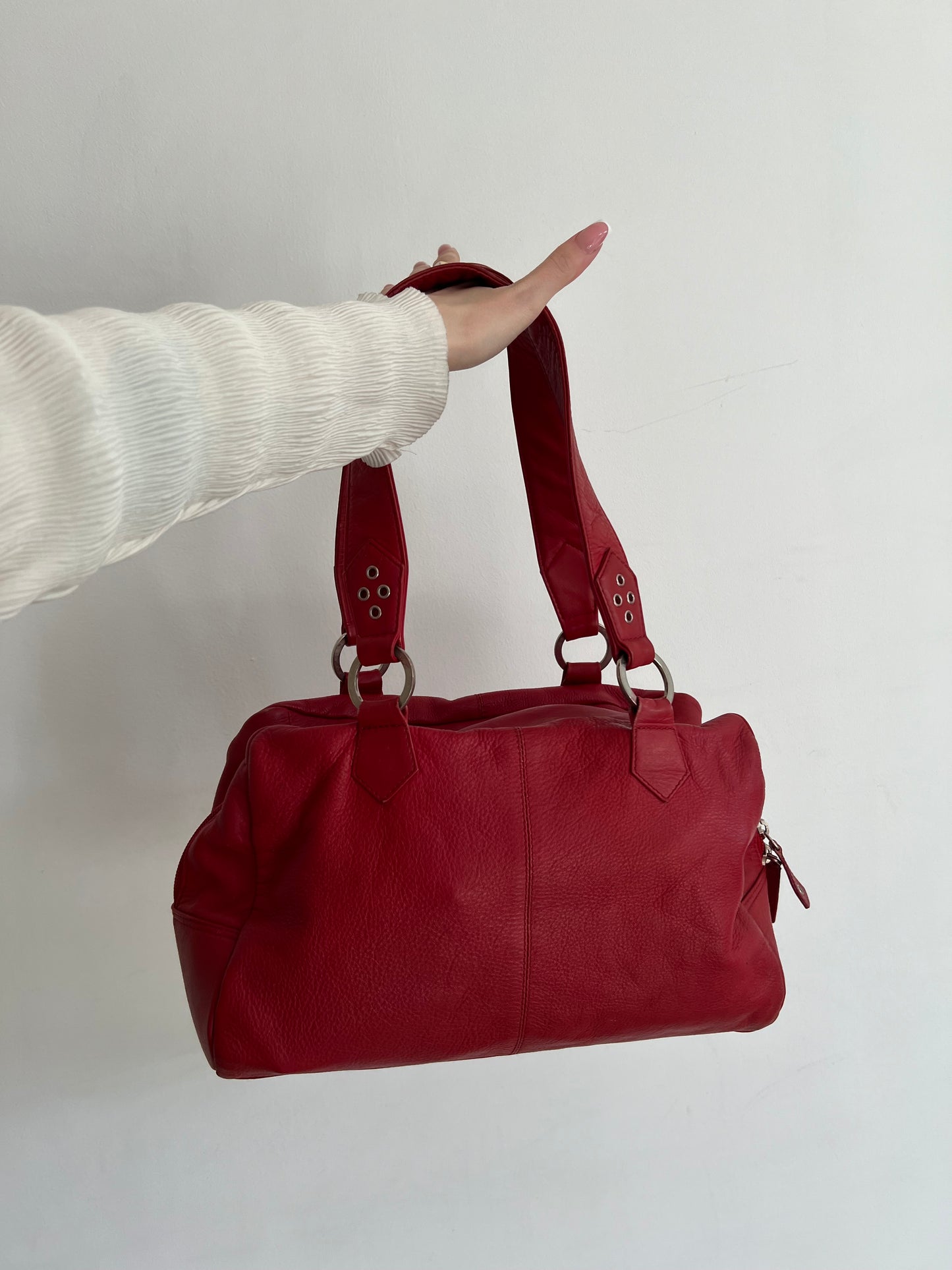 Red bag made of natural leather