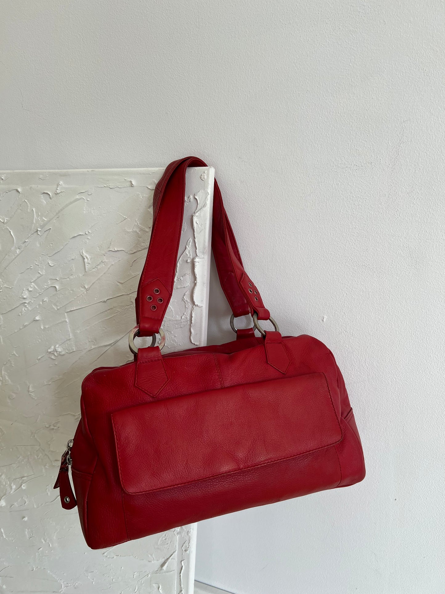 Red bag made of natural leather
