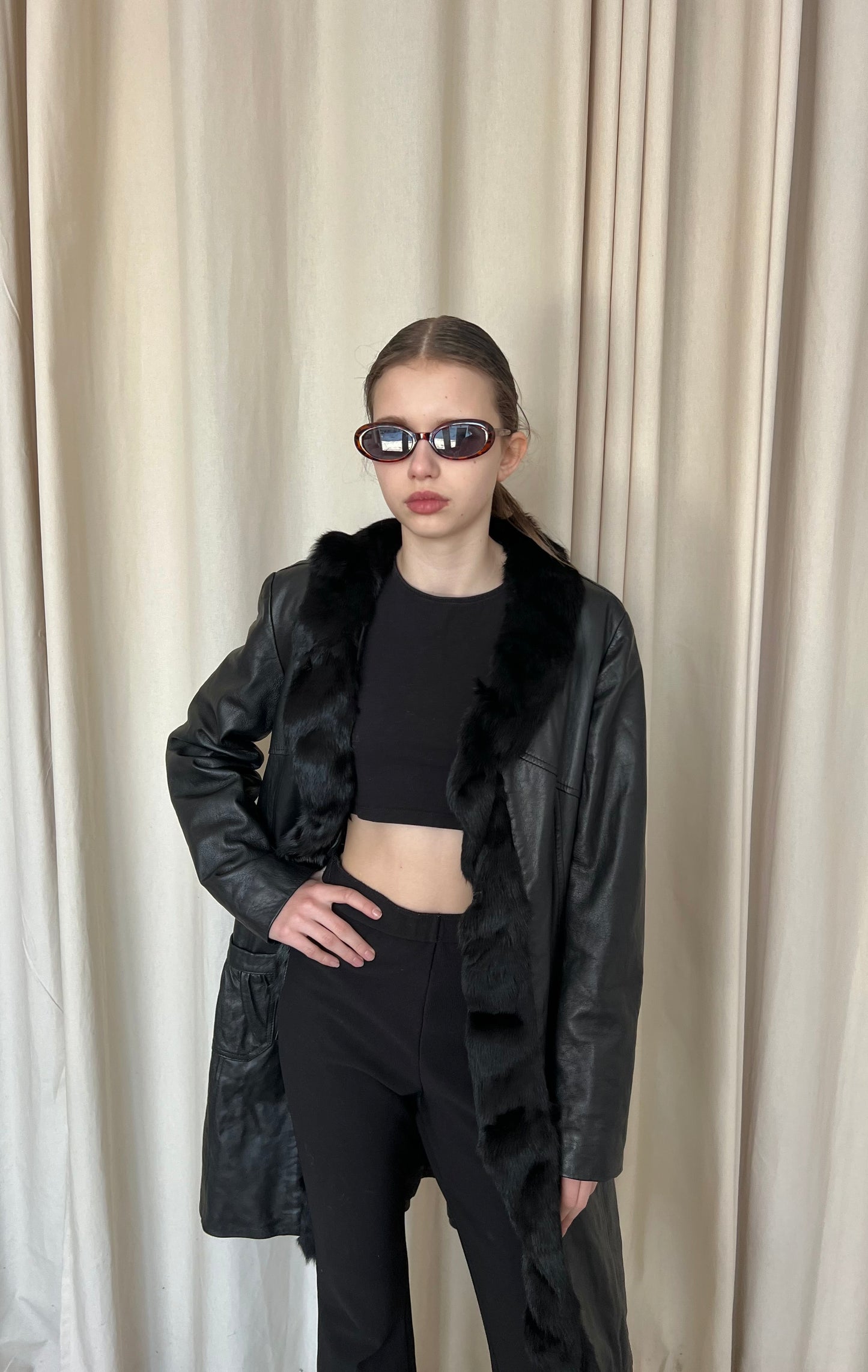Genuine leather coat with fur trim