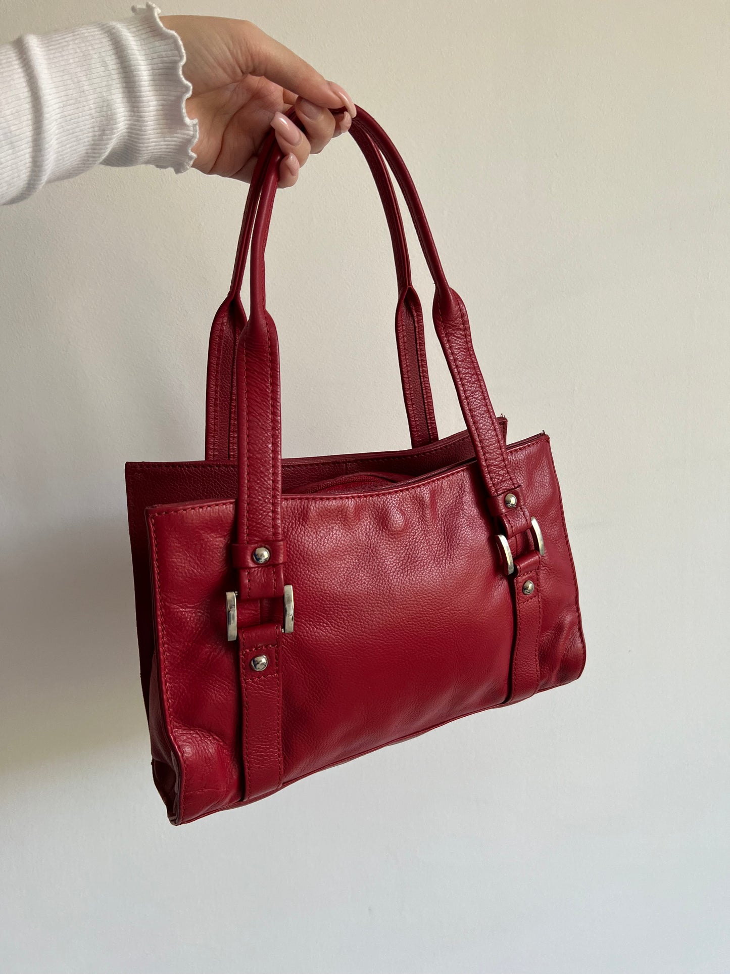 Red bag made of genuine leather