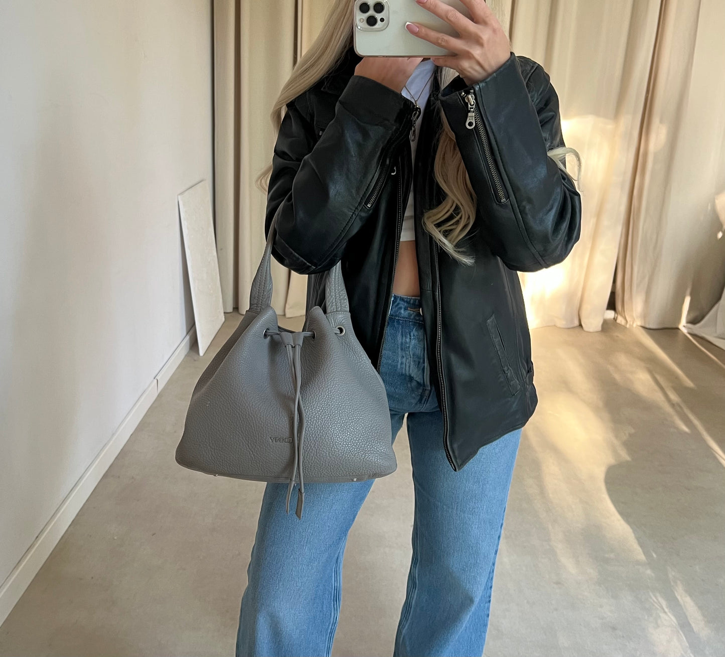 Gray DKNY bag made of genuine leather