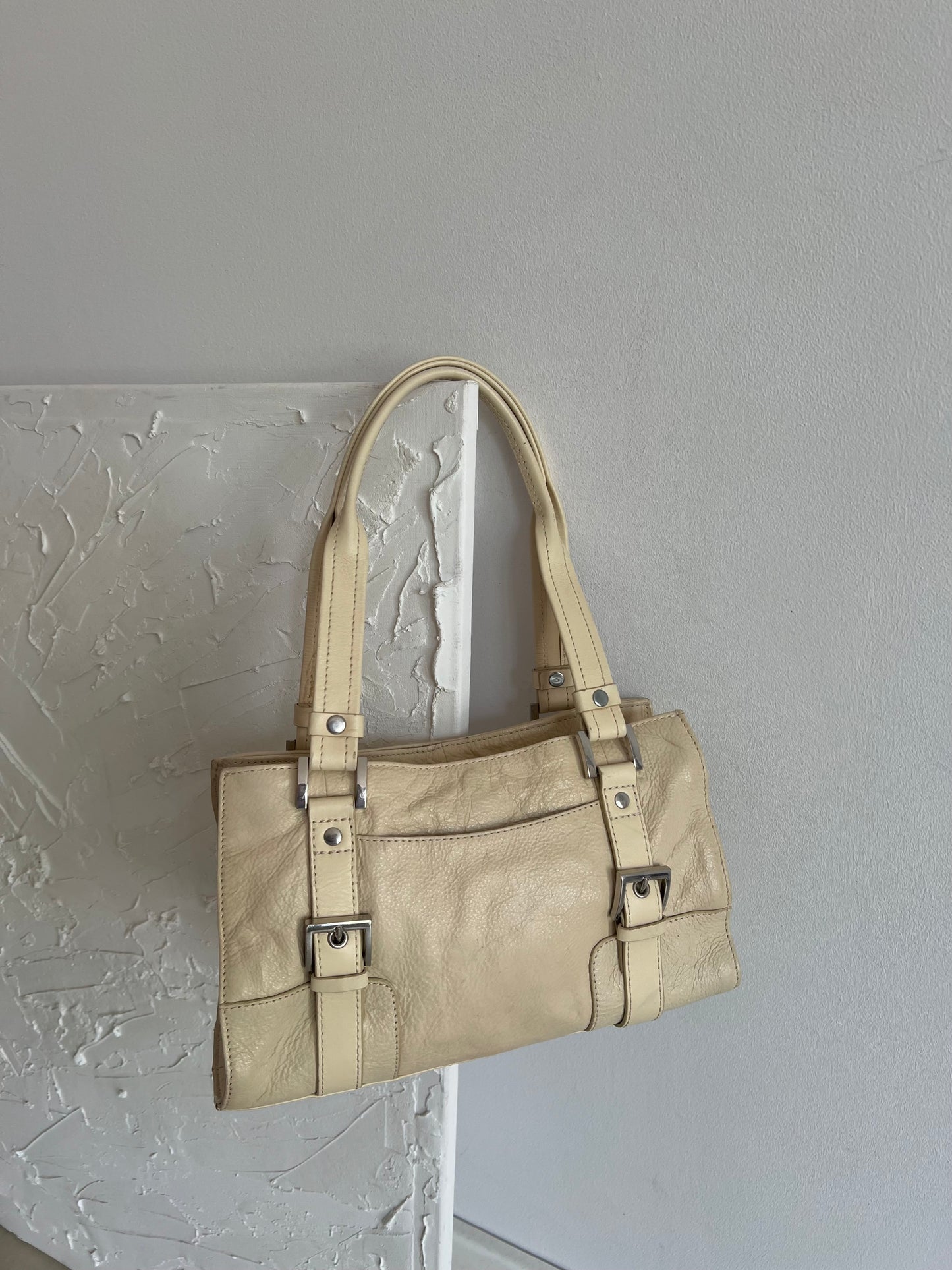 Cream bag made of genuine leather