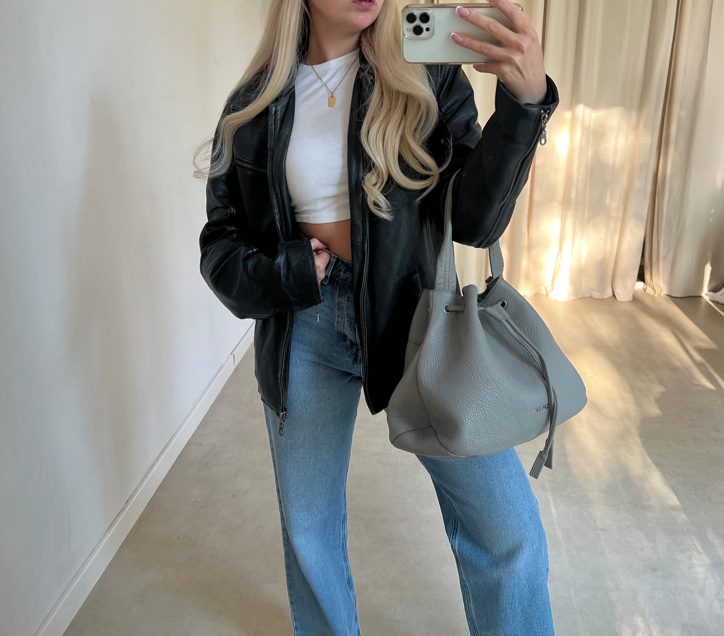 Gray DKNY bag made of genuine leather
